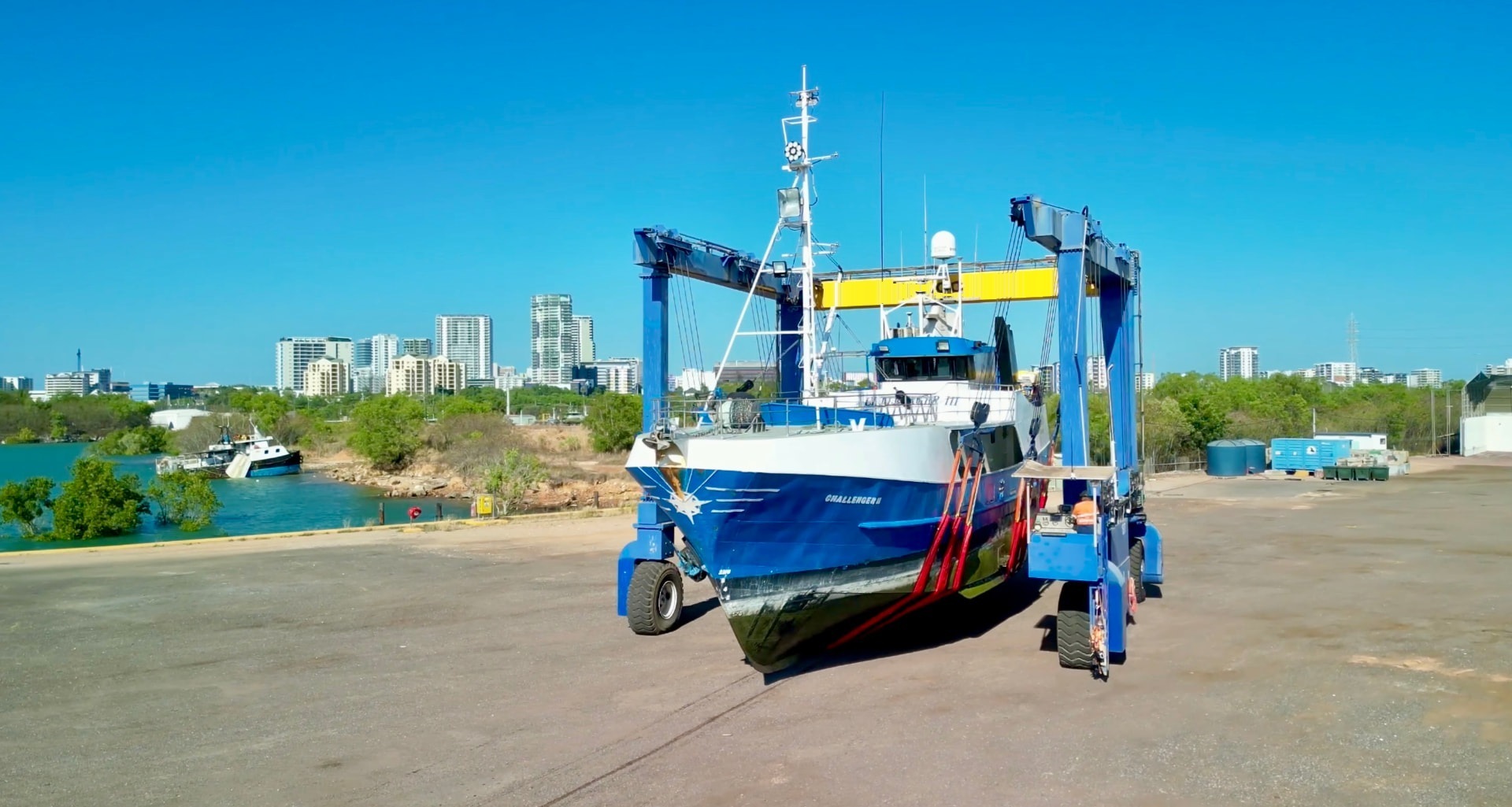 Vessel supported in the slings of the travel lift on the Darwin hardstand